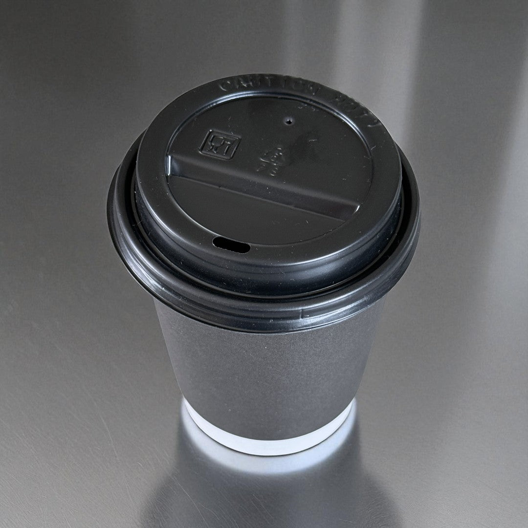 Black Double Wall 8oz Paper Cup With Black Sip Lids Overhead - Propus Packaging