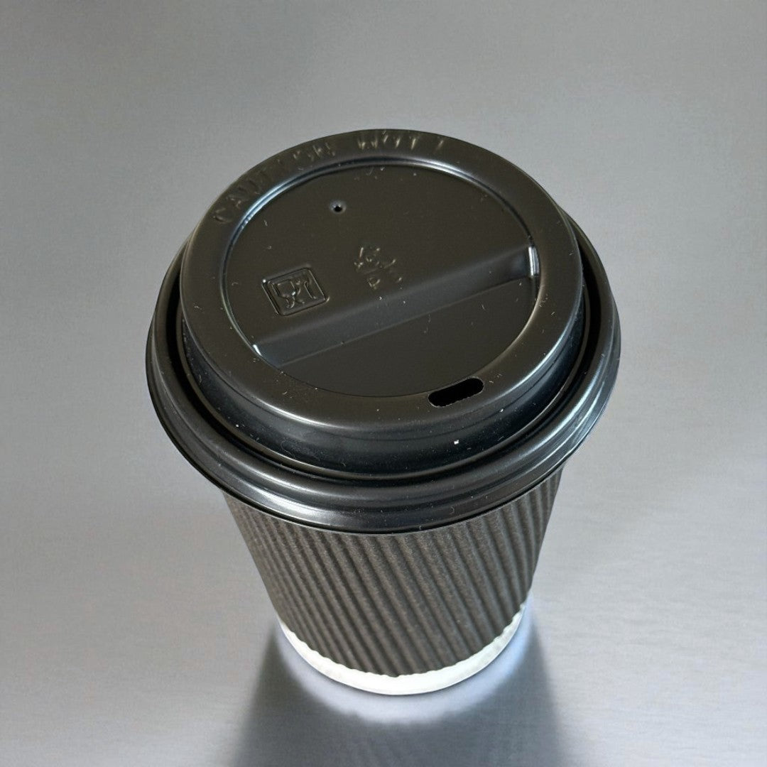 Black Ripple Wall 12oz Paper Cup With Black Sip Lids Overhead - Propus Packaging