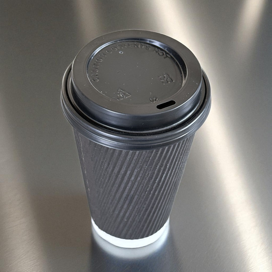Black Ripple Wall 16oz Paper Cup With Black Sip Lids Overhead - Propus Packaging