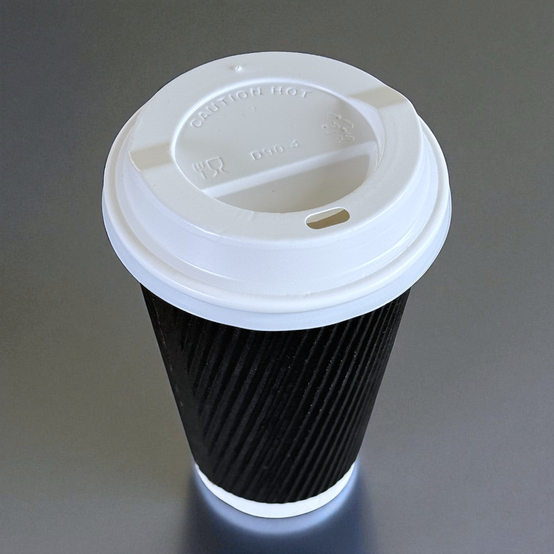 Black Ripple Wall 16oz Paper Cup With White Sip Lids Overhead - Propus Packaging