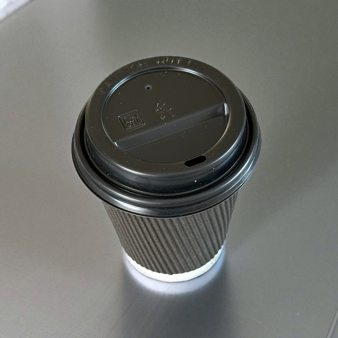 Black Ripple Wall 8oz Paper Cup With Black Sip Lids Overhead - Propus Packaging
