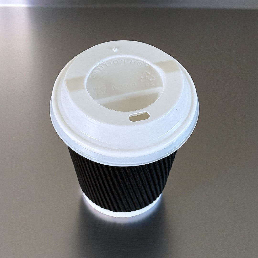 Black Ripple Wall 8oz Paper Cup With White Sip Lids Overhead - Propus Packaging