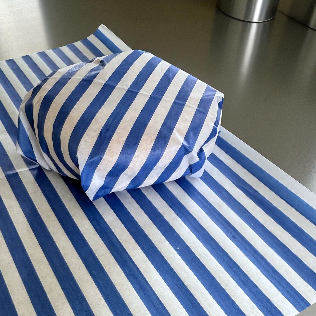 Blue Stripe Greaseproof Burger Wrap Sheets 250x320mm Lifestyle - Propus Packaging