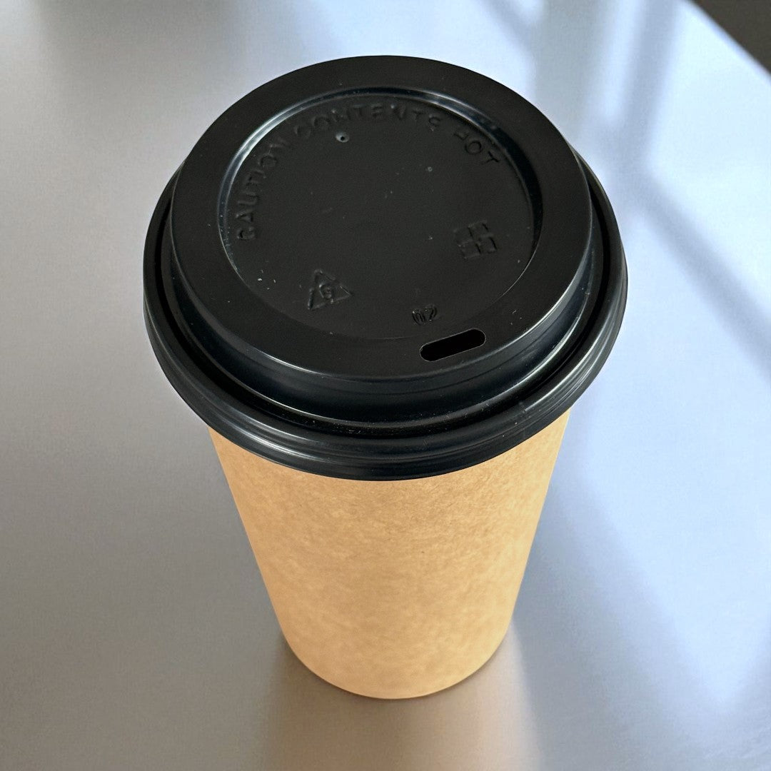 Kraft Single Wall 16oz Paper Cup With Black Sip Lid Overhead - Propus Packaging