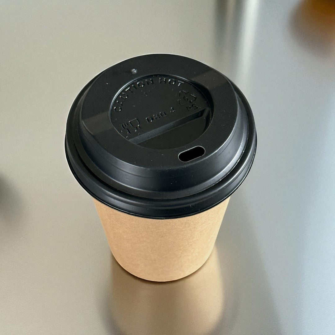 Kraft Single Wall 8oz Paper Cup With Black Sip Lid Overhead - Propus Packaging