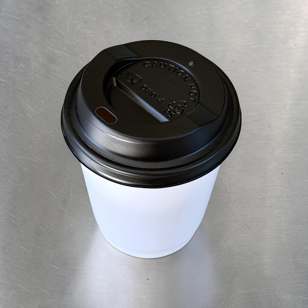 White Double Wall 8oz Paper Cup With Black Sip Lids Overhead - Propus Packaging