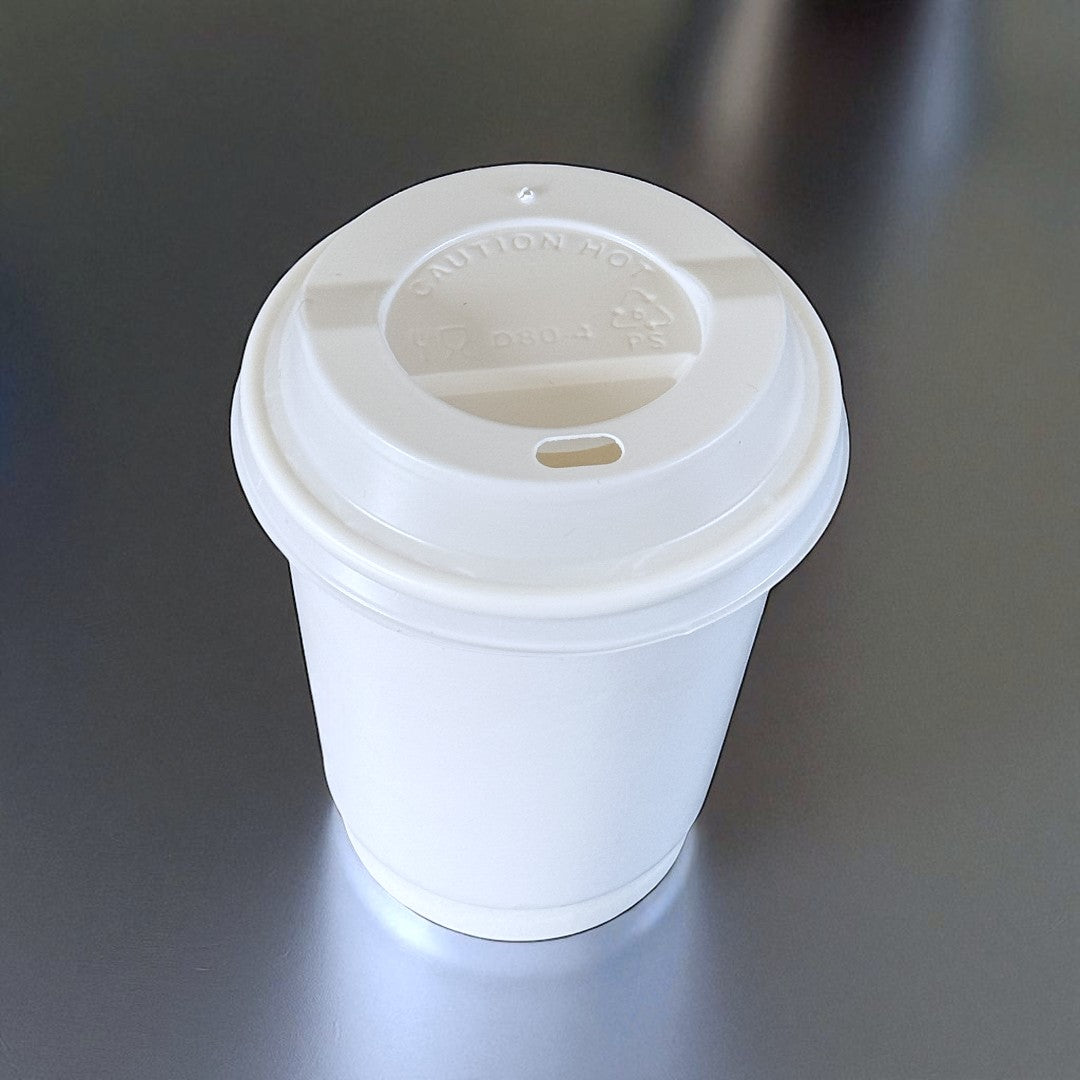 White Double Wall 8oz Paper Cup With White Sip Lids Overhead - Propus Packaging