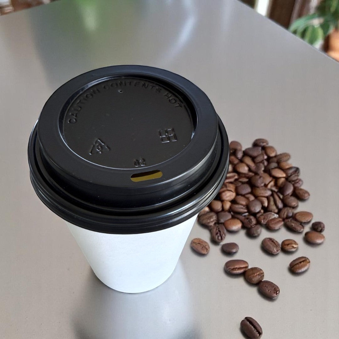 White Single Wall 8oz Paper Cup With Black Sip Lids Lifestyle - Propus Packaging